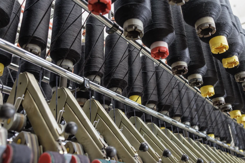 Strategic apparel manufacturing process in a modern garment factory in Bangladesh.